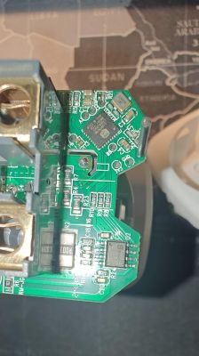 Circuit Board with Microchip in Smart Socket Close-up of a circuit board with a microchip in a smart socket.