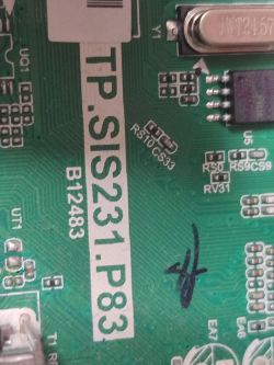 TV Motherboard TP.SIS231.P83 Close-up of a TV motherboard labeled TP.SIS231.P83