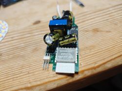 Cozylife Homekit 9W RGBWW E27/A60 Module Cozylife Homekit 9W RGBWW E27/A60 module on a wooden table