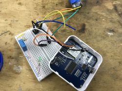 Teardown of the TH06 clock/thermometer/hygrometer and UART reverse engineering