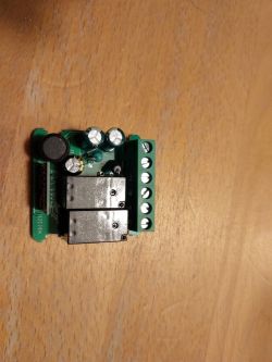 Roller Shutter Controller Roller shutter controller on a wooden table.
