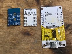 Electronic modules on a wooden surface.