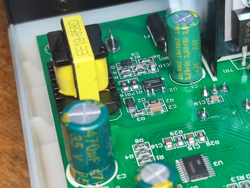 Interior of 858 Soldering Station Close-up of the interior of a 858 soldering station showing electronic components on the PCB.
