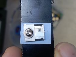Microscopic chip on a transistor mounted on a board.