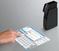 CES 2010 - projektor HLP zamienia blat w interaktywny ekran CES 2010 - projektor HLP zamienia blat w interaktywny ekran