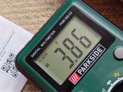 Voltage Measurement with Parkside Digital Multimeter A digital multimeter by Parkside showing a 3.86 V voltage reading on the display.