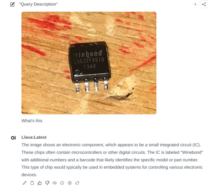 Winbond Integrated Circuit on Wooden Surface Image of an integrated circuit with the label Winbond on a wooden surface.