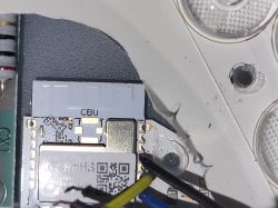 CBU electronic module with wires and part of an LED enclosure