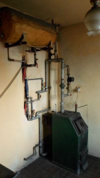 Improvement of the old type central heating boiler in Olsztyn Improvement of the old type central heating boiler in Olsztyn