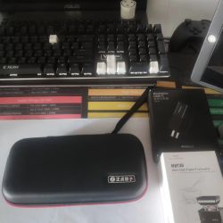 Close-up of keyboard, Positive Point Atom case, Thinkplus charger, and MHP30 box
