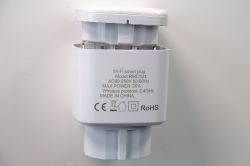 Wi-Fi Smart Plug with Energy Meter - Model RMC021 Close-up of the back of a Wi-Fi smart plug with technical details and certifications.
