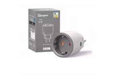 White Sonoff S60 smart plug next to a gray retail box on a white background