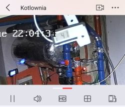 Camera view in boiler room showing a thermometer reading 41°C on water pipes