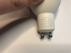 Close-up of Ewelink SMART GU10 LED Bulb Base Close-up of LED bulb base with the text Ewelink SMART GU10.