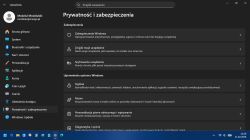 Ekran Ustawienia Windows 11: sekcja „Prywatność i zabezpieczenia” w trybie ciemnym