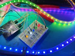 WS2812B LED strip connected to breadboard with RGB LEDs and wiring