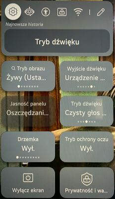 Menu ustawień telewizora z różnymi opcjami dźwięku, obrazu i funkcji oszczędzania energii.