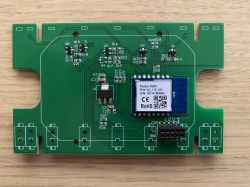 Close-up of a circuit board from a triple switch showing the WB3S chip.