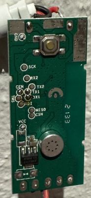 Close-up of a circuit board with various soldering points and electronic components.