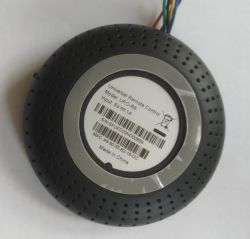 Bottom Part of Universal Remote UFO-R6 Photo of the bottom part of a universal remote UFO-R6 from China, featuring a label with model, power, and MAC number details.