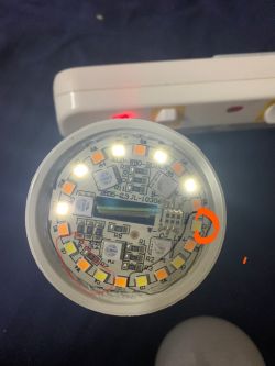 Image of an LED board with flickering diodes in a lamp.