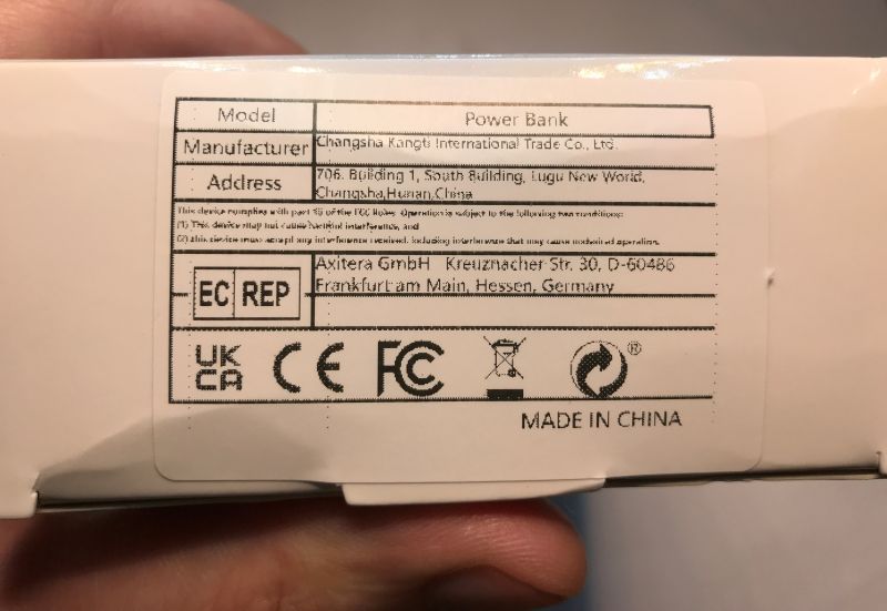 Power bank package label with manufacturer details and CE, FCC, UKCA marks, plus “MADE IN CHINA”