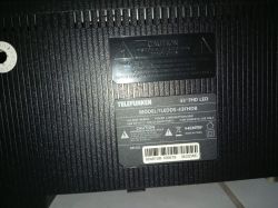 Back label on a Telefunken 43 FHD LED TV with model, power specs, warnings, and barcode