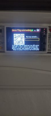AT4P HD smart display with IoT monitor showing Waiting network... message with a QR code for app download.