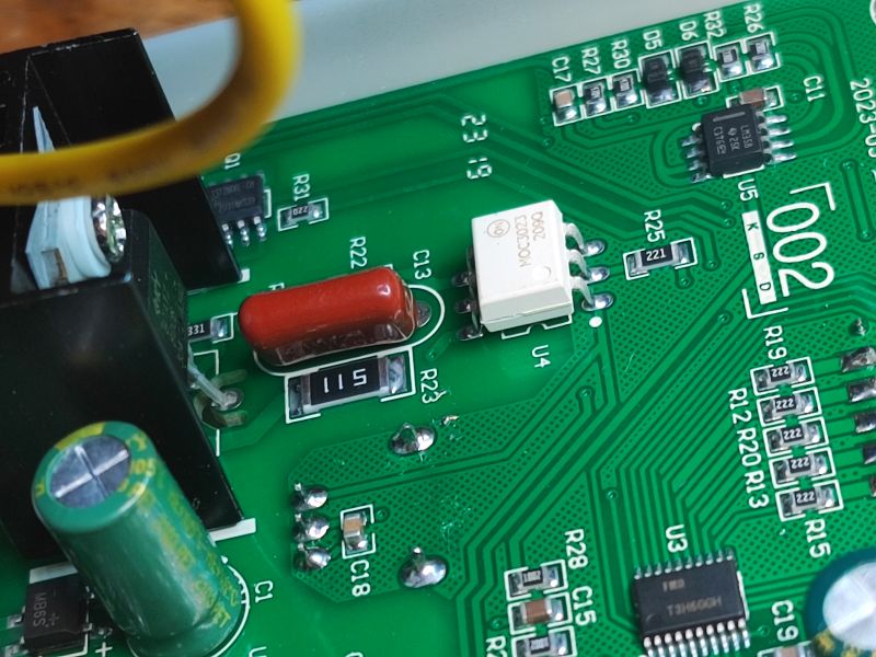 Close-up of Components on a Printed Circuit Board Close-up of electronic components on a green printed circuit board.