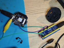 Electronic boards connected with wires on a wooden table