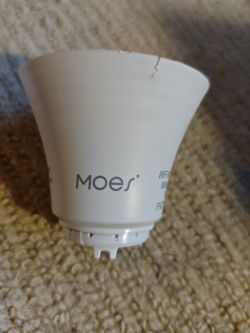Moes light bulb with a crack on the top section of the casing.