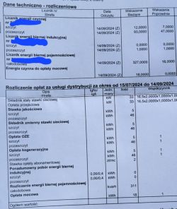 Zdjęcie faktury za energię z wyszczególnieniem opłat i odczytów liczników.