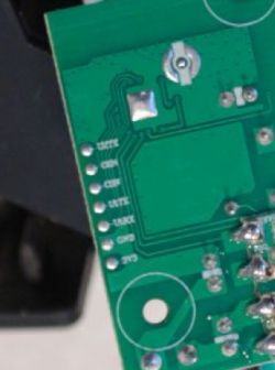 Close-up of a circuit board with visible test points.