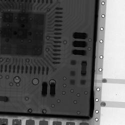 X-ray image of an ESP32-S3 board showing internal electronic components.
