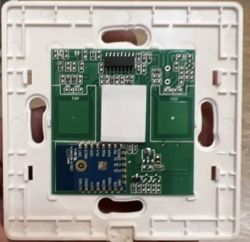 UBARO WiFi switch circuit board on a white frame.
