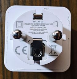 Back view of a BLOW smart socket showing visible scratches.
