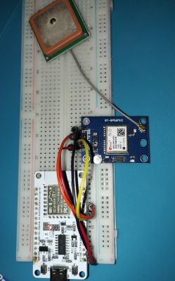 GPS module connected to ESP8266 microcontroller on a breadboard
