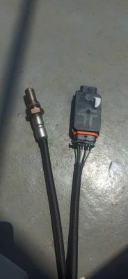 Two cables with sensor and connector ends on a gray background.