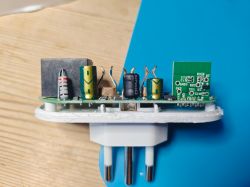 Interior of eWelink Smart Plug with Power Monitoring Internal view of the eWelink smart plug with electronic components.