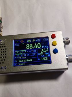 View of the TEF6686 radio displaying station information on the screen.