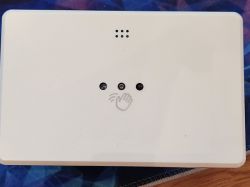 Touchless hand switch Deta Grid Connect with three openings and a hand icon on a white casing.