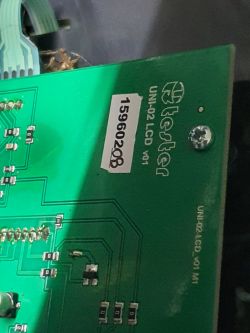 Close-up of a circuit board labeled Tester UNI-02 LCD v01.