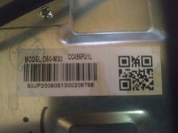 Label with barcode and QR code on device model D50-M30.