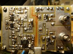 Electronic Circuit on PCB Electronic circuit on a PCB with visible connections and soldered components.