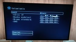 Ekran z ustawieniami sieciowymi, pokazujący konfigurację DHCP na urządzeniu.