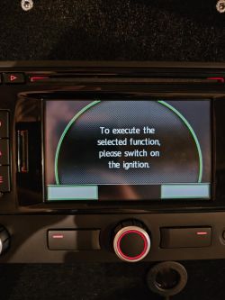 Car radio RNS315 screen displaying the message: To execute the selected function, please switch on the ignition.