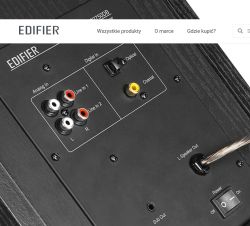 Panel złącz audio na tylnej ściance głośnika Edifier z wejściami RCA, cyfrowymi oraz wyjściem głośnikowym.