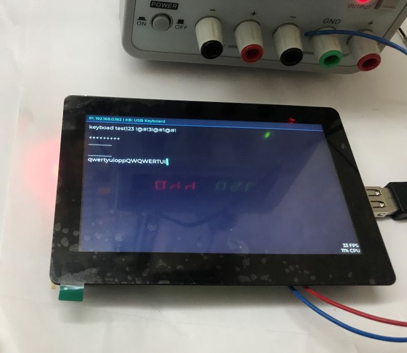 Touchscreen with black bezel shows typed text from a USB keyboard and IP 192.168.0.162.