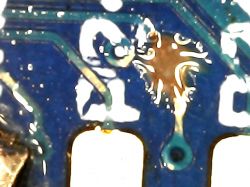 Close-up of circuit traces on a printed circuit board.
