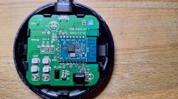 Interior of a universal infrared remote with visible PCB labeled as S06-CB3S-V1.1.